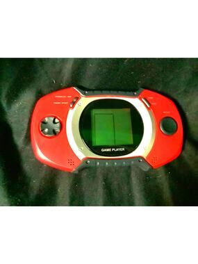 Vintage Atari game control player and handheld